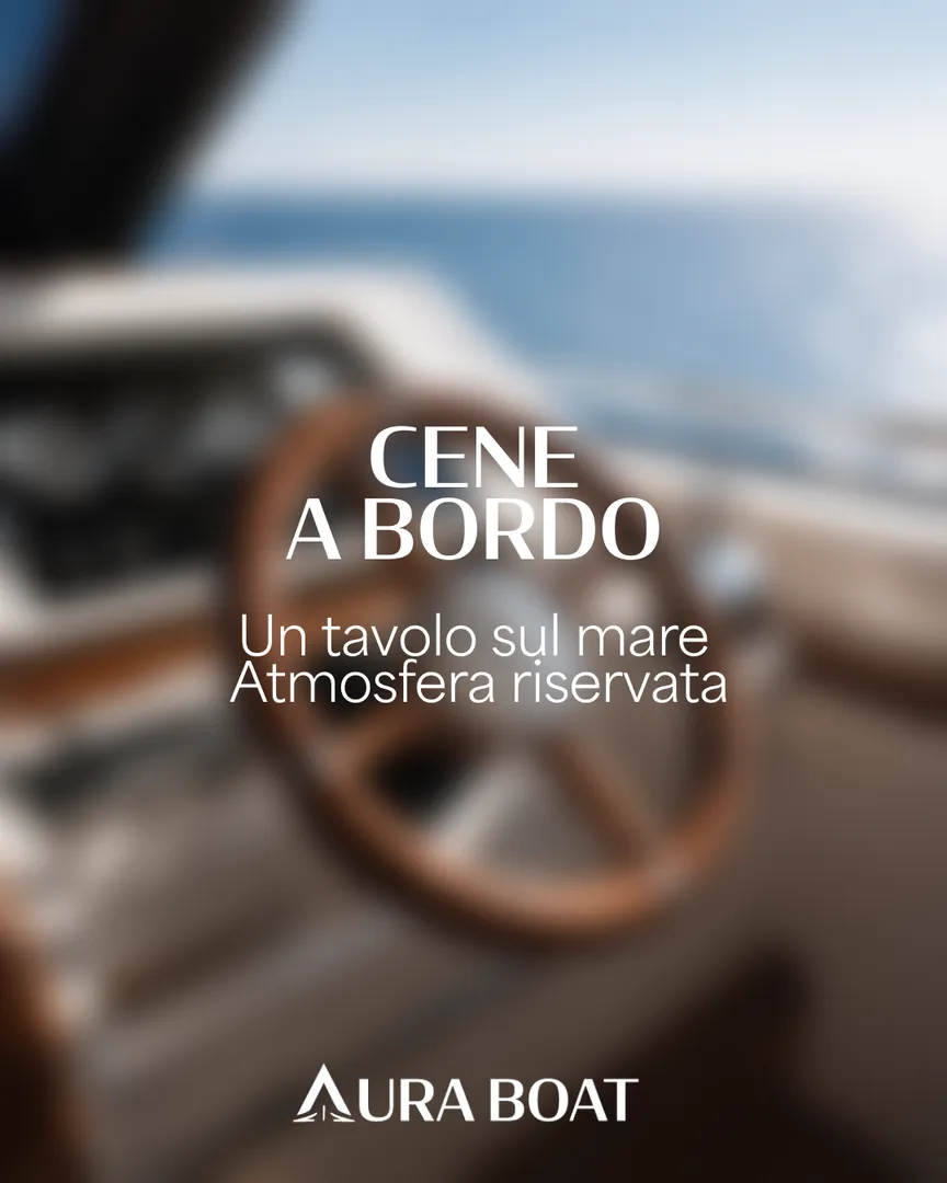 Post Aura Boat «Cene a bordo»: tavolo apparecchiato con vista sul mare